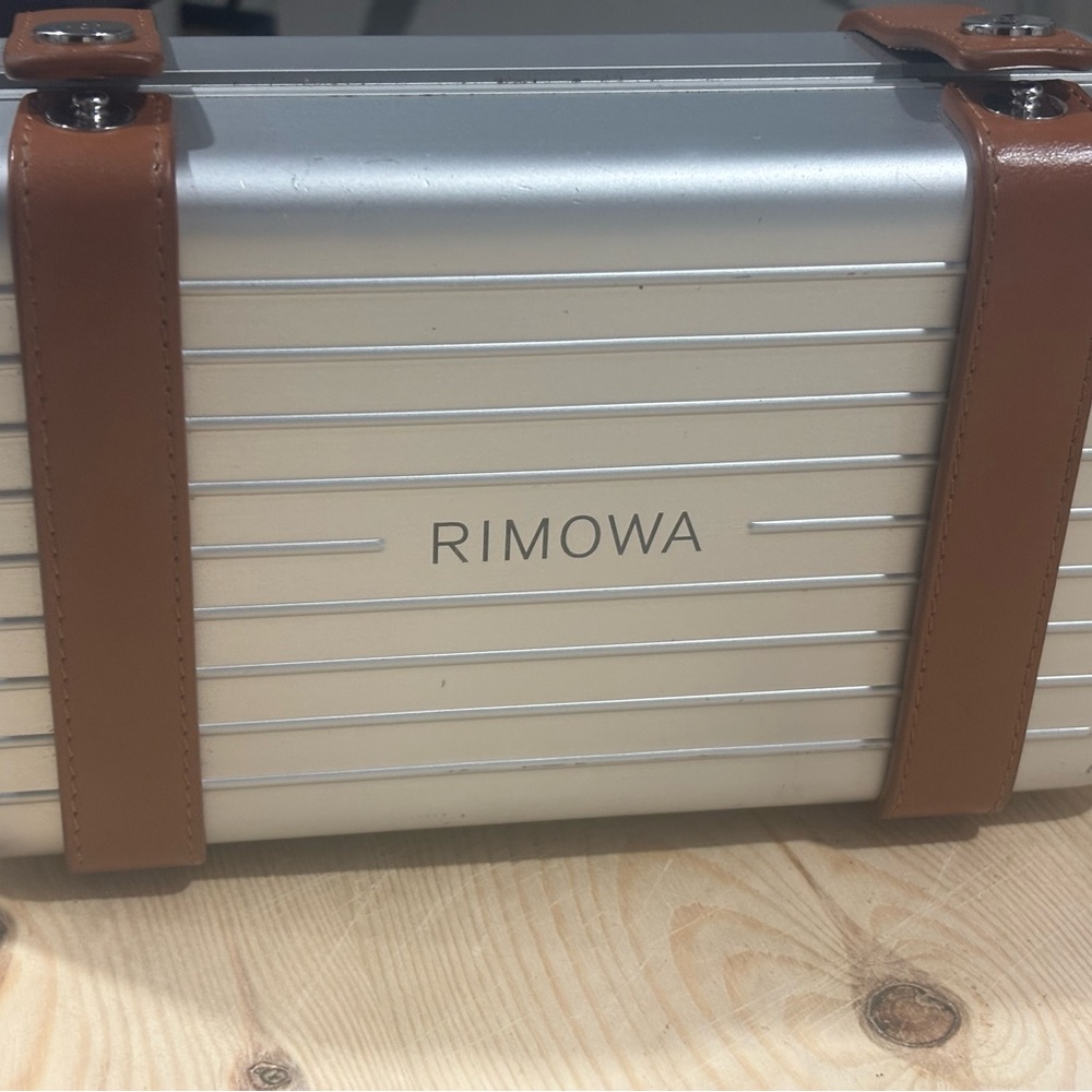 RIMOWA Silver Case with Tan Leather Accents